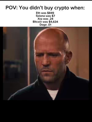 The cover image is a still from a movie featuring a man with a serious expression. Text at the top lists cryptocurrency values from the past, framed as a "POV," or point of view, setup. The man, likely Jason Statham, is positioned within the frame, and in the background there are blurred elements.