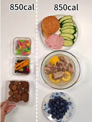 The image is a split view. On the left, there are three small square clear containers, each filled with a different food item. The top container has colorful gummy candies, the middle one contains orange carrots and beet slices, and the bottom one holds brown cookies. On the right, a similar plate contains hamburger bun, a plate with cucumber slices, and slices of ham, topped with a clear bowl containing corn, meat, and broth, and a plate with blueberries.