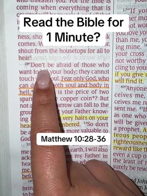 A close-up shot shows a hand pointing to a highlighted passage in an open Bible. Overlayed text in a white box reads 'Read the Bible for 1 Minute?' and 'Matthew 10:28-36'. The image is well-lit and focuses on the text and the hand.