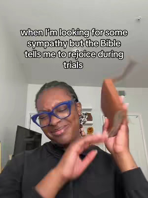 The image features a woman with glasses and a black top. She is holding a Bible as she appears to be crying, with a slightly distressed facial expression. Text overlay provides additional context to the image.