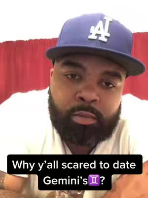 A man wearing a blue baseball cap and a white shirt looks directly at the camera. A black text overlay at the bottom asks, “Why y’all scared to date Gemini’s ♊?"