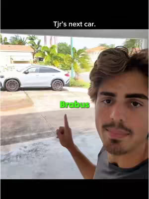 A man points towards a white car, with text overlay suggesting it's his next vehicle. The word "Brabus" is also overlaid. Background includes a house and tropical foliage.