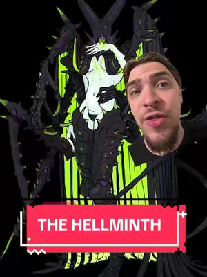 The cover image features a man in the bottom right corner, the main layer is an illustration of a humanoid creature with a black, organic-looking exoskeleton and an eye-catching bright green accent. In the foreground, a red banner displays the text 'THE HELLMINTH' in white capital letters.