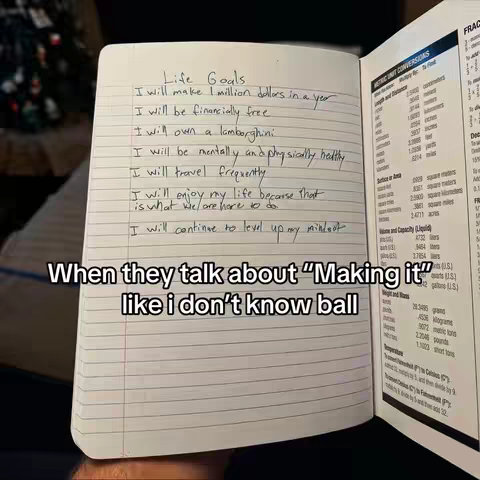 The image shows an open notebook with handwritten "Life Goals" listed. Beside the notebook is a fraction chart guide to math conversion. Below the text is a sentence written in a different font.