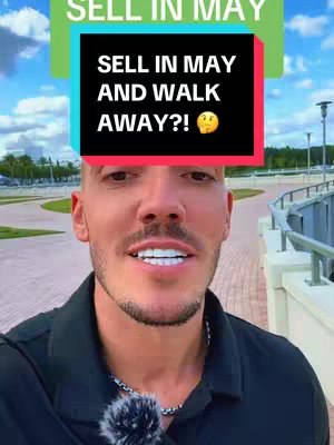 A man with light skin and short, dark hair is centered in the frame, looking towards the camera with a slight smile. Overlayed on top of him is a text box containing the question, 'SELL IN MAY AND WALK AWAY?!' White text is used with black and green background. The man is set against a blurry outdoor background with a path and some buildings.