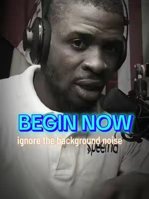 A man wearing headphones and a white shirt is speaking into a microphone. Text overlays in a blue and white gradient read "BEGIN NOW" and "ignore the background noise." The background has hints of a flag.