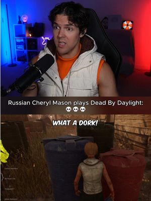 The image is a split screen. The top half shows a man facing the camera with a concerned expression. He is wearing an orange top, a white sleeveless jacket, and a microphone is positioned near his mouth. The background shows a dimly lit room with blue and red hues and a decorative element. The bottom half of the frame displays a section of a video game with a character facing away from the perspective of the camera.