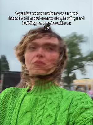 The cover image shows a person from the chest up, wearing a bright green textured sweater against a blurred background. The person's hair is light brown, and the overall image has a slightly blurred effect. Text is overlaid at the top, which reads: "Aquarius women when you are not interested in soul connection, healing and building an empire with us: Vs" and another word appears below, "Vs".
