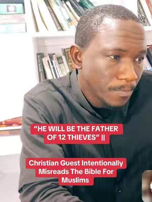 A close-up shot of a Black man looking to the side with a serious expression. Overlay text boxes in red are positioned on the lower mid-section of the frame. Bookshelves are visible in the background.