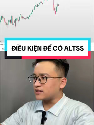 The image features a man wearing glasses and a light-colored shirt, positioned in front of a backdrop with a stock chart and a colored bar with white text overlay. The composition is well-lit, with the man as the focal point. The overall layout seems designed to highlight the speaker and the context of the segment. 