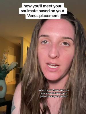 The cover image features a woman with long, light brown hair and a fair complexion. The background is slightly blurred, showing hints of a warm-toned interior with a vase and some decor on a table. The woman is looking at the camera and speaking, with some text overlayed at the top reading “how you'll meet your soulmate based on your Venus placement.” Additional text at the bottom describes the topic of Venus in the chart.