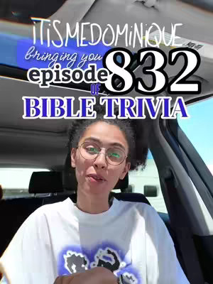 A selfie-style shot features a person in the front seat of a car. Behind the person is a digital overlay with the text "ITSMEDOMINIQUE" at the top and "BIBLE TRIVIA" towards the bottom. The person looks at the camera with a neutral expression. The composition is framed from the chest up.