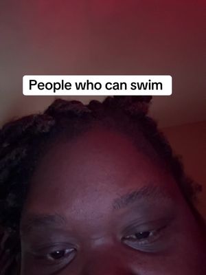 The image shows a close-up of a person's face from the forehead down, with their eyes looking downwards. The person has dark skin and dark hair. A text overlay at the top reads 'People who can swim' in a white rectangle.