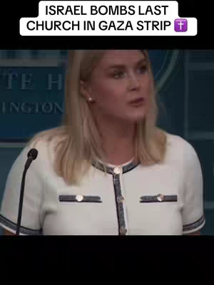 A woman with blonde hair is speaking in front of a backdrop. The screen has the words 'Israel bombs last church in Gaza strip' written on it. She's wearing a cream-colored top with black details.