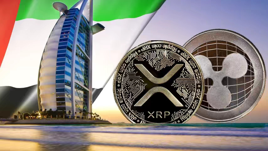 The image presents a composite scene featuring several elements. In the backdrop, a large flag of the United Arab Emirates is prominently displayed, its design easily recognizable with its red, black, white, and green stripes. In front of the flag, dominating the left side, is the Burj Al Arab hotel, one of Dubai's iconic landmarks, its distinct sail-shaped structure gleaming under the sunlight. In the foreground, two large silver coins are central to the composition. One coin prominently features the XRP logo, representing Ripple, while another depicts the Ripple logo. The background suggests a beach scene. Overall, the image combines elements of architecture the UAE flag, cryptocurrency symbols, and landscape to convey a message of investment in real estate.
