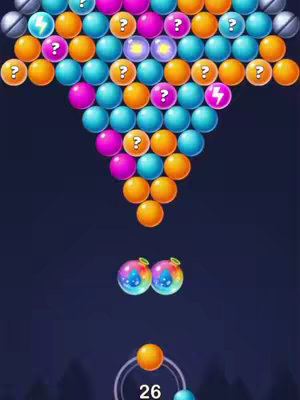 The cover image is a screenshot of a mobile game. A grid of colorful bubbles occupies most of the frame, arranged in a pyramid shape. The bubbles come in shades of orange, blue, pink, and purple. Below the bubble grid, two rainbow-colored bubbles with an added feature are present. It appears to be the player's available shot, hovering above a circular structure with the number '26' at the bottom.
