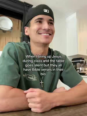 The cover image features a person in a green shirt and a black cap, smiling while looking to their side. Text is overlaid on the image.