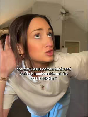 The cover image shows a woman with brown hair in a home setting. She is wearing a white shirt and light blue jeans. Text overlayed on the image reads: "the day Jesus comes back and Satan is banished to hell for ALL ETERNITY". The woman appears emotional with an open mouth expression. Behind her is a light-colored room with typical home decor components.