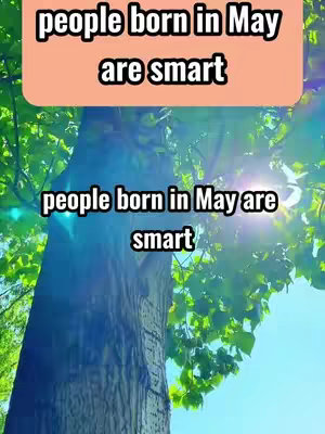 The cover image features a tall tree trunk framed by lush green leaves, with bright sunlight in the background, creating a vibrant, natural scene. Text overlays read 'people born in May are smart' in a bold, white font, with a peach-colored background.