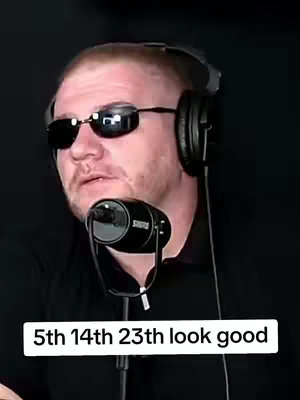 The image shows a man with short, light-colored hair, wearing dark sunglasses and a headset. He is positioned in front of a microphone, suggesting a podcast or video recording. A text overlay at the bottom reads "5th 14th 23th look good."