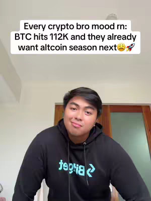 A man wearing a black hoodie with the word 'tegria' on it is in the foreground, with a white text box overlayed at the top. The text discusses crypto and bitcoin hitting $112k.