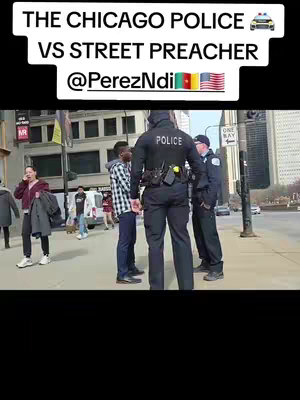 The cover image shows a street scene in a city, likely Chicago, featuring several individuals, including police officers and other civilians engaged in a discussion. The main subject is framed by the presence of the Chicago Police officers and another man, possibly a street preacher. The color palette is natural with building facades and a clear sky. The layout is dynamic, with the focus on the interaction among the people present.