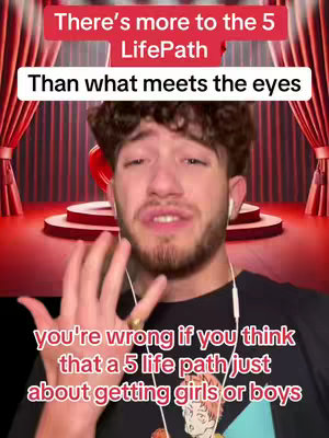 The cover image features a young man speaking directly to the camera in a studio setting. Above him, red text announces astrology and numerology content related to a "5 LifePath". The background is stylized like a stage with red curtains and a softly lit platform with a large heart-shaped decoration.