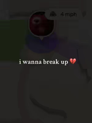 The image is a dark, vertical shot. At the center is the phrase "i wanna break up" in a simple, white, sans-serif font with a broken heart emoji in red. Behind the text, obscured by the darkness, is a blurred, abstract background, with a vague, circular shape near the top suggesting a profile picture.
