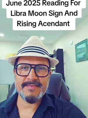 A man wearing a hat and glasses is looking directly at the camera, with text overlayed at the top. He is in a room with neutral-colored walls. The image has a slightly warm tone with a focus on the man's face.