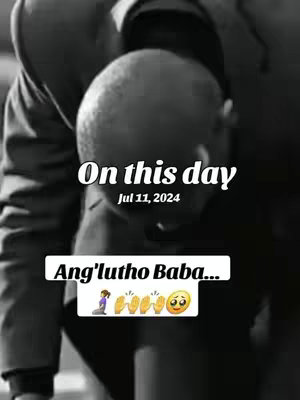 A black and white image showing a person from the shoulders up, with their head bowed. Text overlays include a date and the phrase "Ang'luthu Baba..." with a series of emojis beneath.