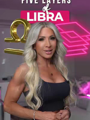 A woman with long blonde hair and a black top faces the camera, with text overlays and a gold Libra symbol. Behind her, there are neon pink geometric shapes with a blurred interior background.