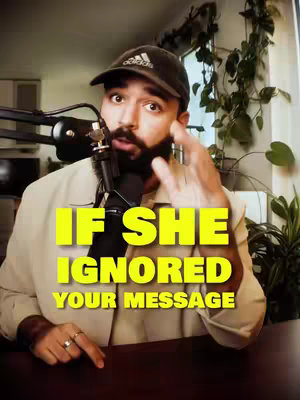 A man wearing a dark baseball cap and a light jacket is the central figure in a video cover. He is positioned in front of a desk with a microphone and greenery in the background. The man is making a hand gesture, and overlaying the image are large, yellow text boxes that read "IF SHE," "IGNORED," and "YOUR MESSAGE." The overall lighting suggests a studio or home environment.