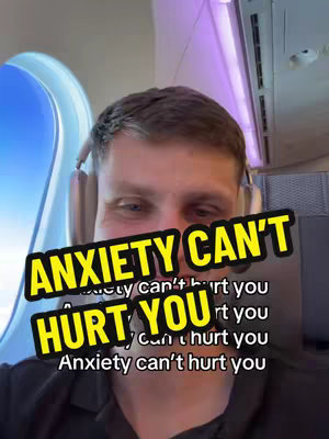 The cover image shows a man in the foreground against an airplane window and ceiling. The background has a window showing a blurred view of a bright sky outside. Overlaid are two text boxes. One has "ANXIETY CAN'T" in yellow and the other "HURT YOU" in yellow, both with a black outline. Below are additional text elements in a stacked format.