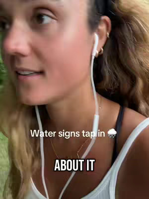 The cover image shows a close-up of a woman's face, with curly hair. She is wearing white earphones and a white tank top. The background is blurred green.