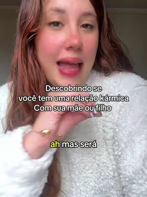A woman with long, reddish-brown hair is featured in a close-up shot. She is looking slightly to the side with her mouth open as if she's speaking. Overlay text is present, which features text about karmic relationships.