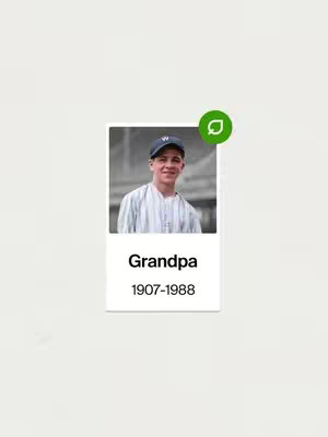 A small, white card with a photo of a young man wearing a baseball cap and a striped shirt. Text below the photo reads 'Grandpa 1907-1988'. The background is a simple white and the image has a green speech bubble icon in the upper right corner.