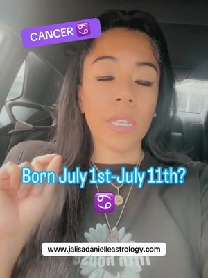 A woman with dark hair and a light complexion is seated inside a car, giving a presentation. Text overlays include astrology information and the website.