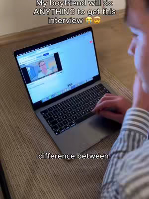 The cover image shows a person, seen from over the right shoulder, looking at a laptop on their lap. The laptop screen displays a video call with another person on the screen. The background is of a light-colored rug or cushion, and the overall lighting is soft and natural.