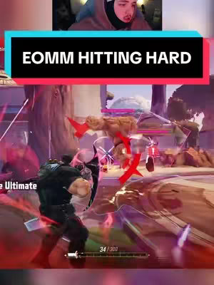The cover image shows a split-screen composition. The top part features a streamer, possibly the creator, with a gaming setup in the background. The lower part shows an in-game scene. The overlay features the text "EOMM HITTING HARD" in bold white font and a black and red background.