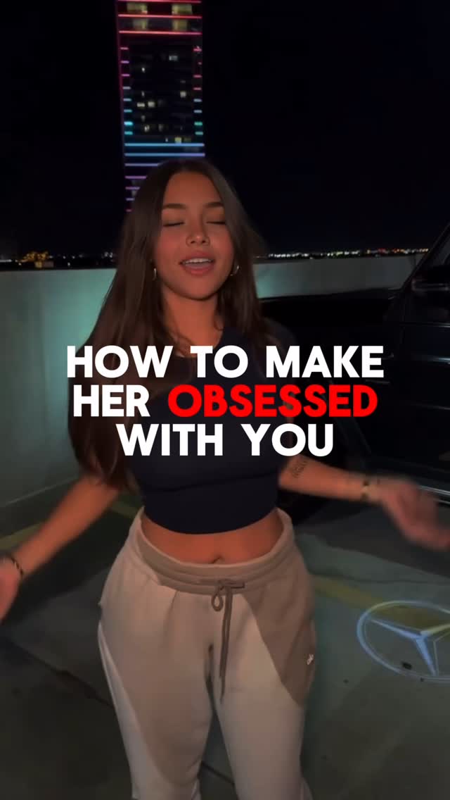 The cover image shows a young woman standing in front of a building at night. She is wearing a black top and beige sweatpants with a Mercedes logo visible. The image has text overlaying her indicating the video's title.