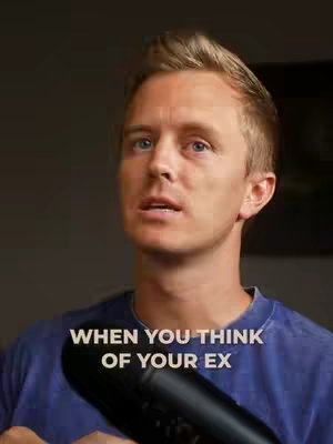The cover image shows a man with short, blond hair looking towards the left with a questioning expression. He's wearing a dark blue t-shirt. Below him, a black microphone is visible. White text overlayed on the image says 'WHEN YOU THINK OF YOUR EX'. The background is slightly blurred and dark.