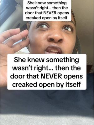 The cover image is a selfie featuring a woman with a concerned expression. She has dark hair and is positioned in front of a blurred background, likely indoors. Two text overlays are present, one above and one below, both in white font and a black rectangular background. The text in the overlay reads, "She knew something wasn't right... then the door that NEVER opens creaked open by itself."