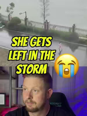 The cover image is a split screen. The top half shows a street scene in rainy weather. A person in pink clothing runs along a wet road in the rain. The bottom half features a man's face, a close-up from the chest up, with a blurred background. Text in a bold yellow font overlays the street scene, while a crying emoji with tears is placed to the right of the text. The man looks towards the center of the screen.