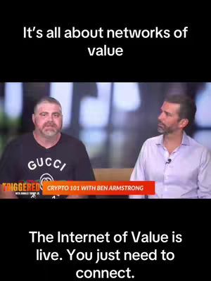 The cover image shows two men sitting in a studio setting. The man on the left is wearing a black t-shirt with the word "GUCCI" on it, while the man to the right is wearing a light-colored button-down shirt. Text overlays at the top and bottom of the image. The background appears to be blurred, suggesting a focus on the speakers.
