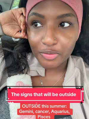 A woman with dark skin and black hair is in the driver's seat of a car. She has a pink headband and a nose ring. Text overlay with the title "The signs that will be outside" and a list of zodiac signs below.