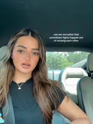 The cover image shows a young woman in the front seat of a car. She is looking at the camera with a slight pout. The background includes a side window showing greenery, the front seat headrest just behind the woman, and a dark car interior.