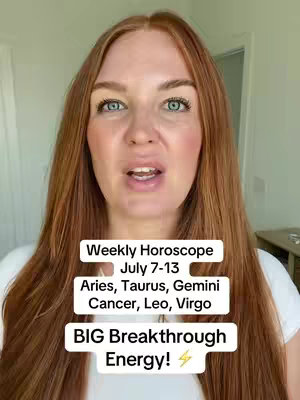 A woman with long red hair and fair skin is centered in the frame, looking directly at the viewer and talking. Overlayed on the image are several white text blocks with black text. The background is a light-colored wall with a hint of a door or doorway on the right side. Overall, the image presents a simple indoor setting lit with natural lighting.