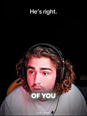 A selfie of a young man looking towards the left with curly brown hair and headphones. Text overlays read, “He’s right.” and “OF YOU”. The background is black, and the lighting is focused on his face and shoulders, giving a sense of emphasis.