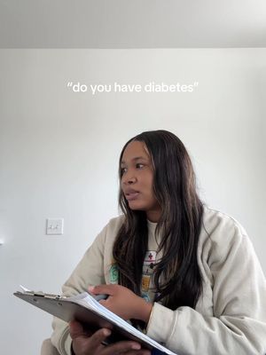 A young woman looks to her left, holding a clipboard and pen. The visual focus is on her upper body and head. At the top of the frame, overlaid text reads, "do you have diabetes", in a white font.