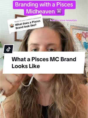A woman is centered in a selfie-style shot, with her face taking up most of the frame. A white box with text sits in front of her face, and the background is somewhat blurred, showing a room. Overlay text in a rectangular banner says 'Branding with a Pisces Midheaven'.